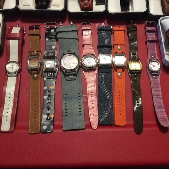 Lot of 17 mostly unworn leather look band watches. main image 2